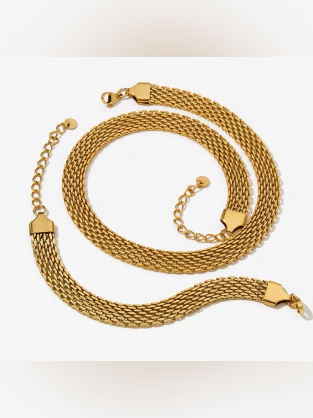 New! 18K Gold Plated  Chain Necklace and Bracelet 

Stainless Steel Set